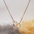 Golden Pearl Knot Necklace